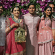 FILE PHOTO: (L-R) Radhika Merchant, Anant Ambani, Nita Ambani, Akash Ambani, Isha Piramal, Anand Piramal and Mukesh Ambani, the Chairman of Reliance Industries, pose during a photo opportunity at the wedding ceremony of Akash, at Bandra-Kurla Complex in Mumbai, India, March 9, 2019. REUTERS/Francis Mascarenhas/File Photo